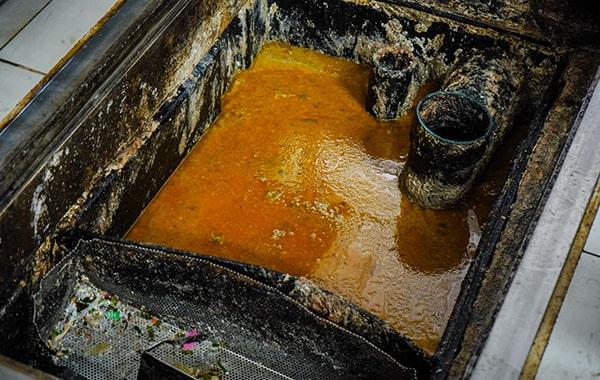 you should schedule grease trap cleaning for your dining establishment a minimum of every 90 days to prevent build-up